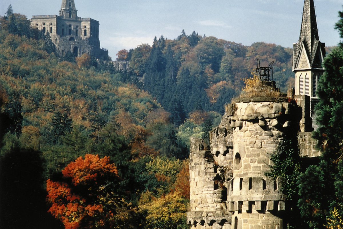 Wilhelmshöhe Castle in autumn forest